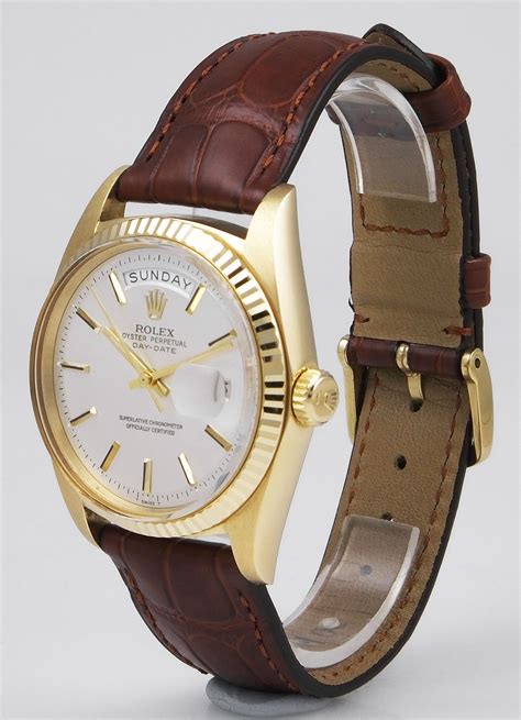 rolex oyster with leather strap.